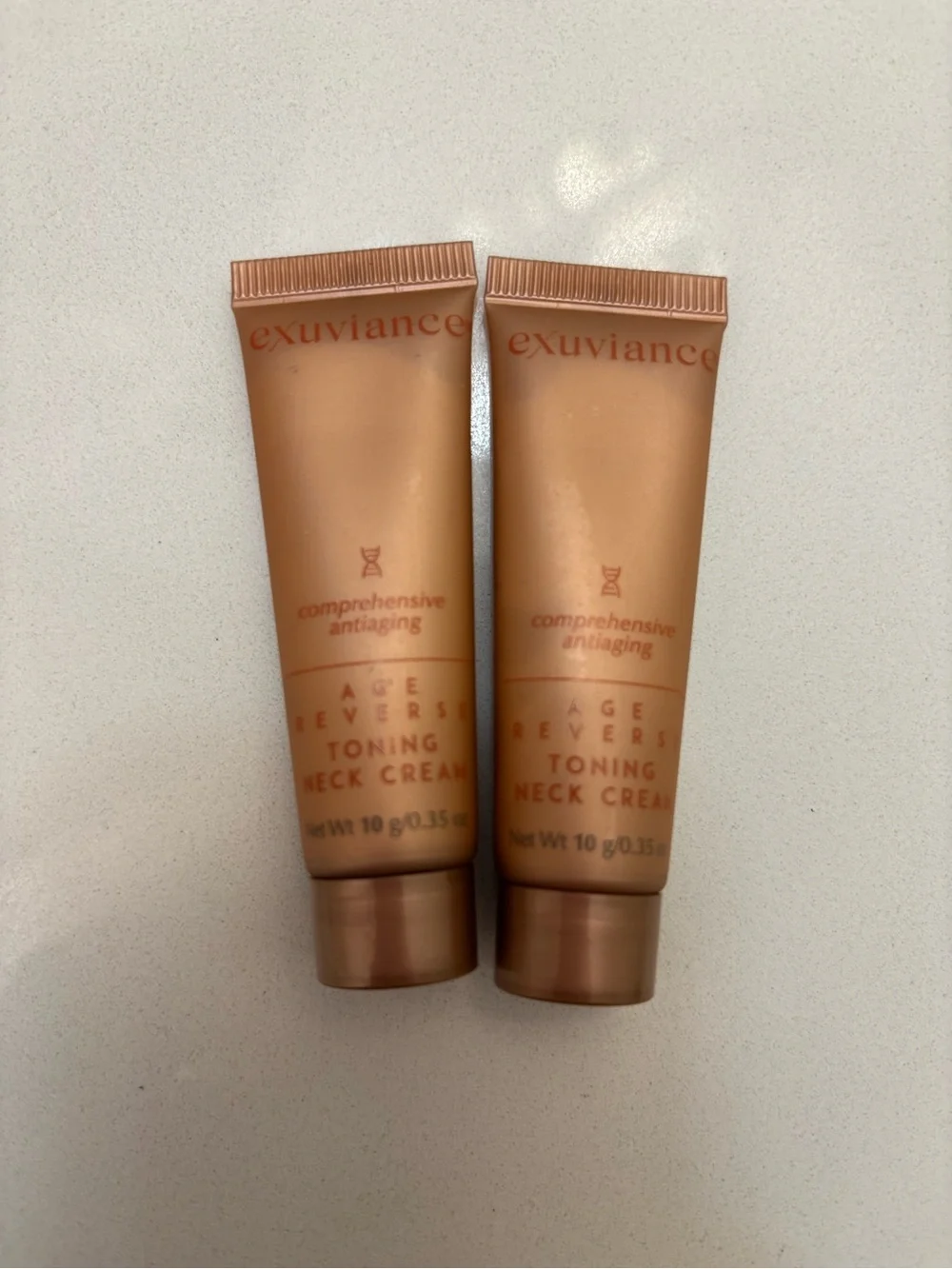 NEW Exuviance Age Reverse Toning Neck Cream - .35oz travel size (Pack of 2)